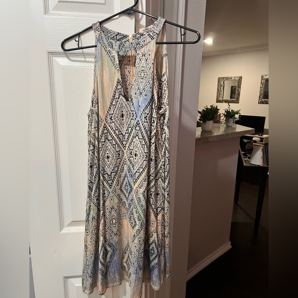 Tart Aztec print dress w/ keyhole front. Looks great with boots,sandals or heels